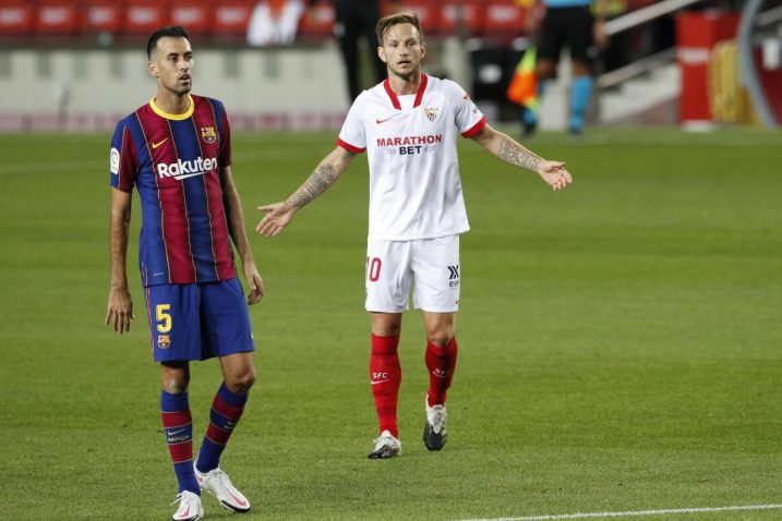 Ivan Rakitić (Sevilla) i Sergio Busquets (Barcelona)/Foto REUTERS