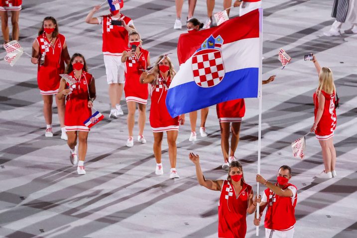 Sandra Perković i Josip Glasnović s hrvatskim stijegom/Foto PIXSELL