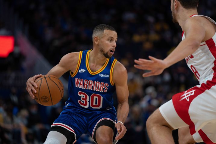 Stephen Curry i Jae'Sean Tate/Foto REUTERS