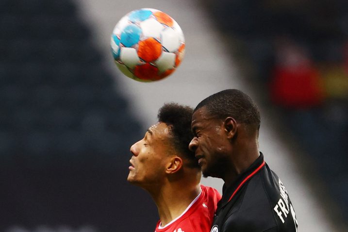 Karim Onisiwo (Mainz) i Evan Ndicka (Eintracht Frankfurt)/Foto REUTERS