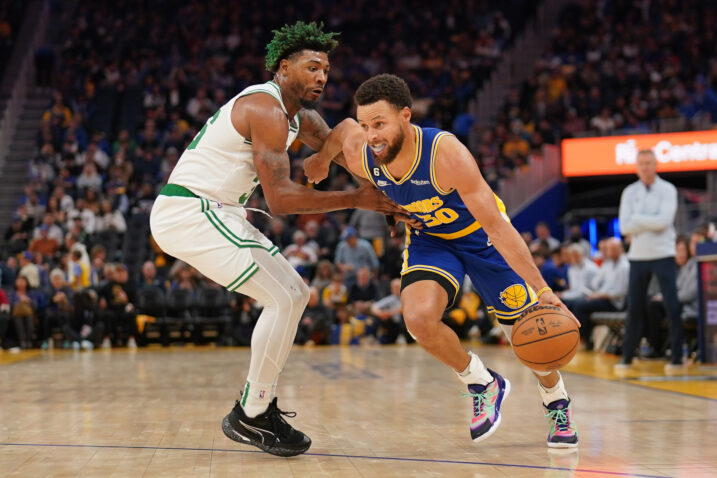 Stephen Curry i Marcus Smart/Foto REUTERS
