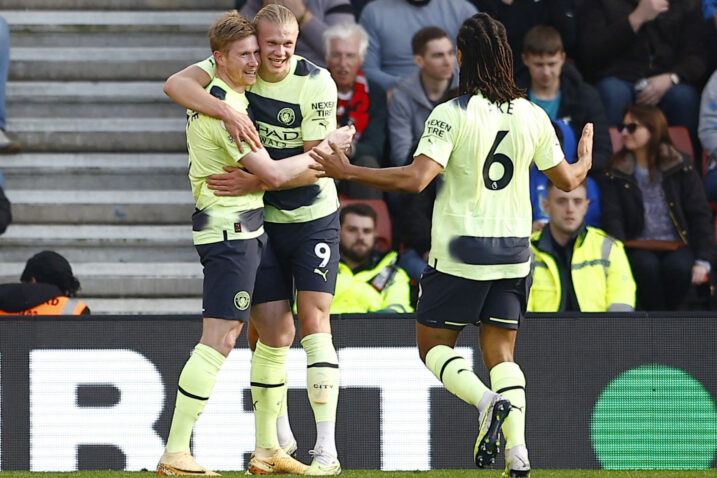 Kevin De Bruyne, Erling Braut Haaland i Nathan Ake/Foto REUTERS