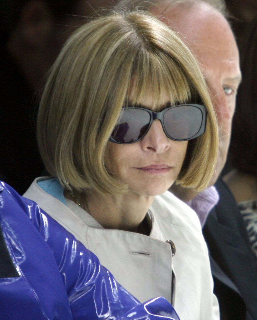 Vogue editor in chief Anne Wintour attends the Burberry Spring/Summer 2007 women's fashion collection, unveiled in Milan, Italy, Monday, Sept. 25, 2006. (AP Photo/Luca Bruno)