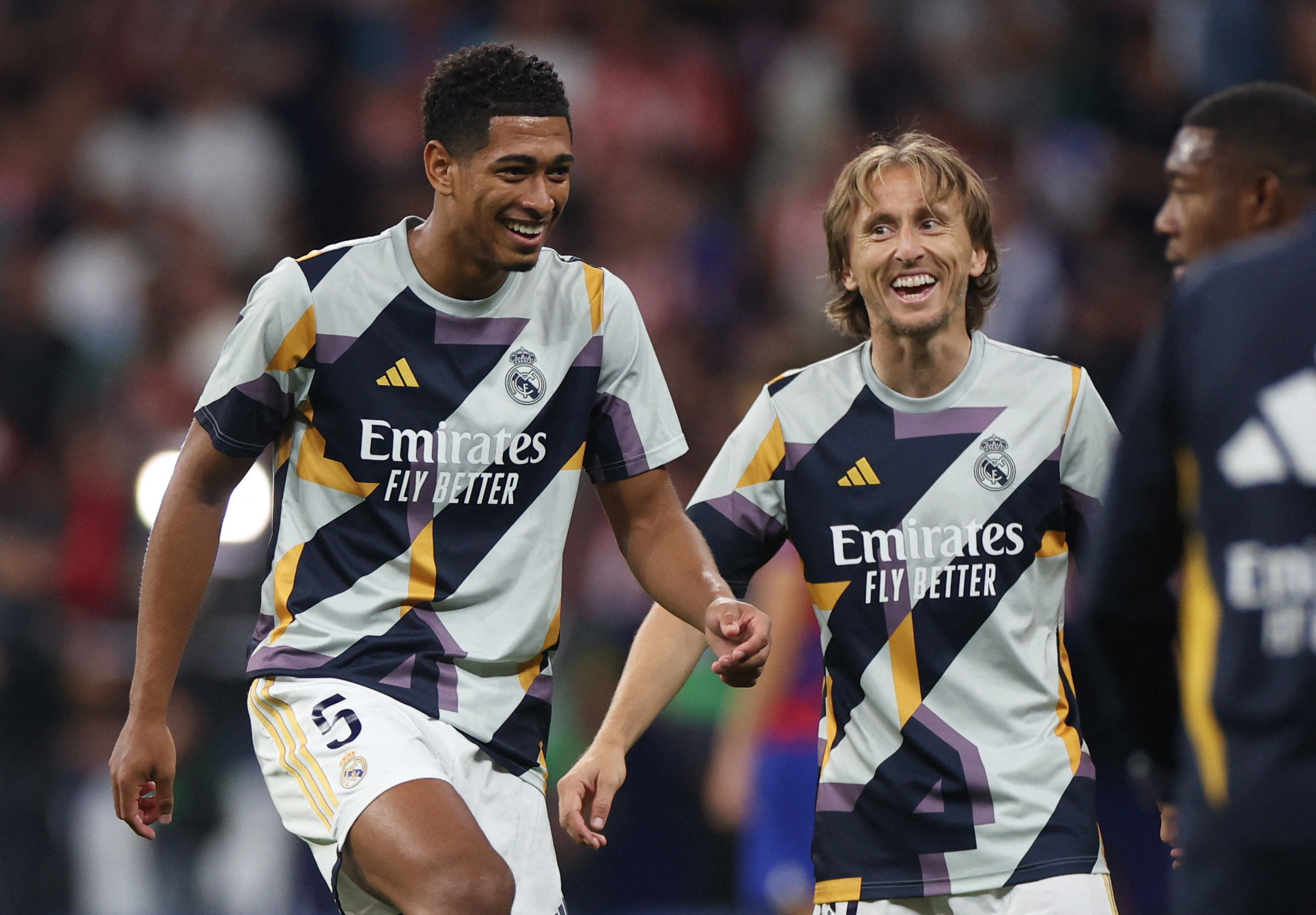 Jude Bellingham i Luka Modrić/Foto REUTERS