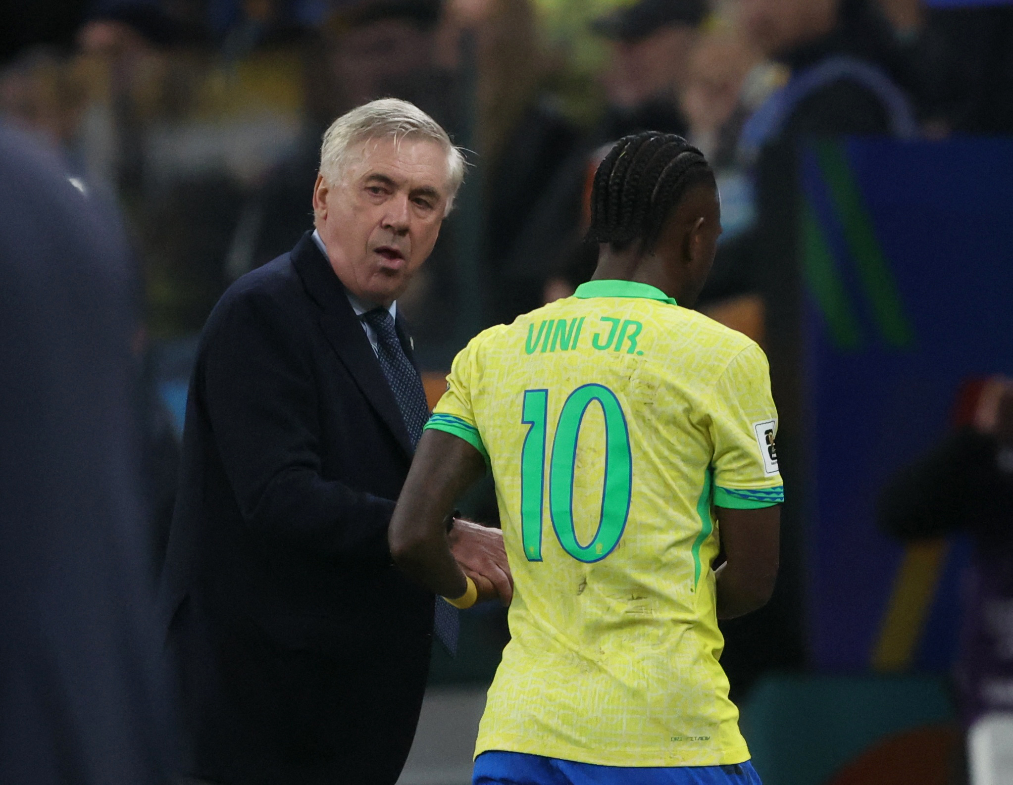 Carlo Ancelotti i Vinicius Junior/Foto REUTERS