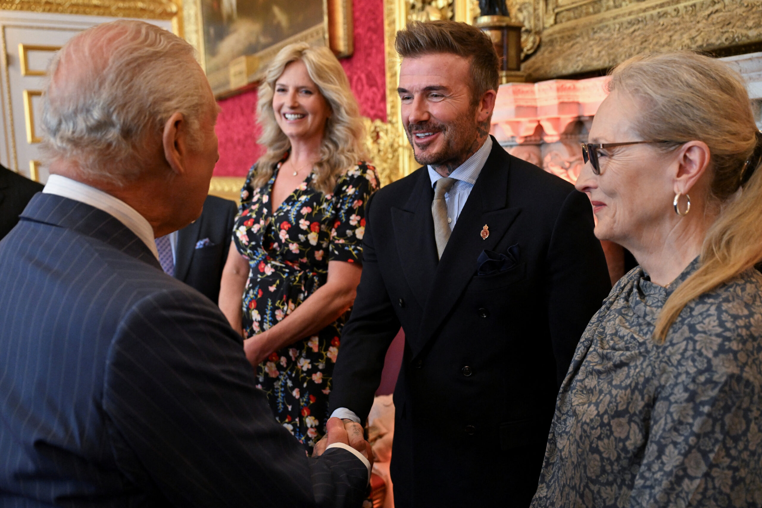 David Beckham i Merly Streep u društvu Kralja Charlesa/Foto REUTERS
