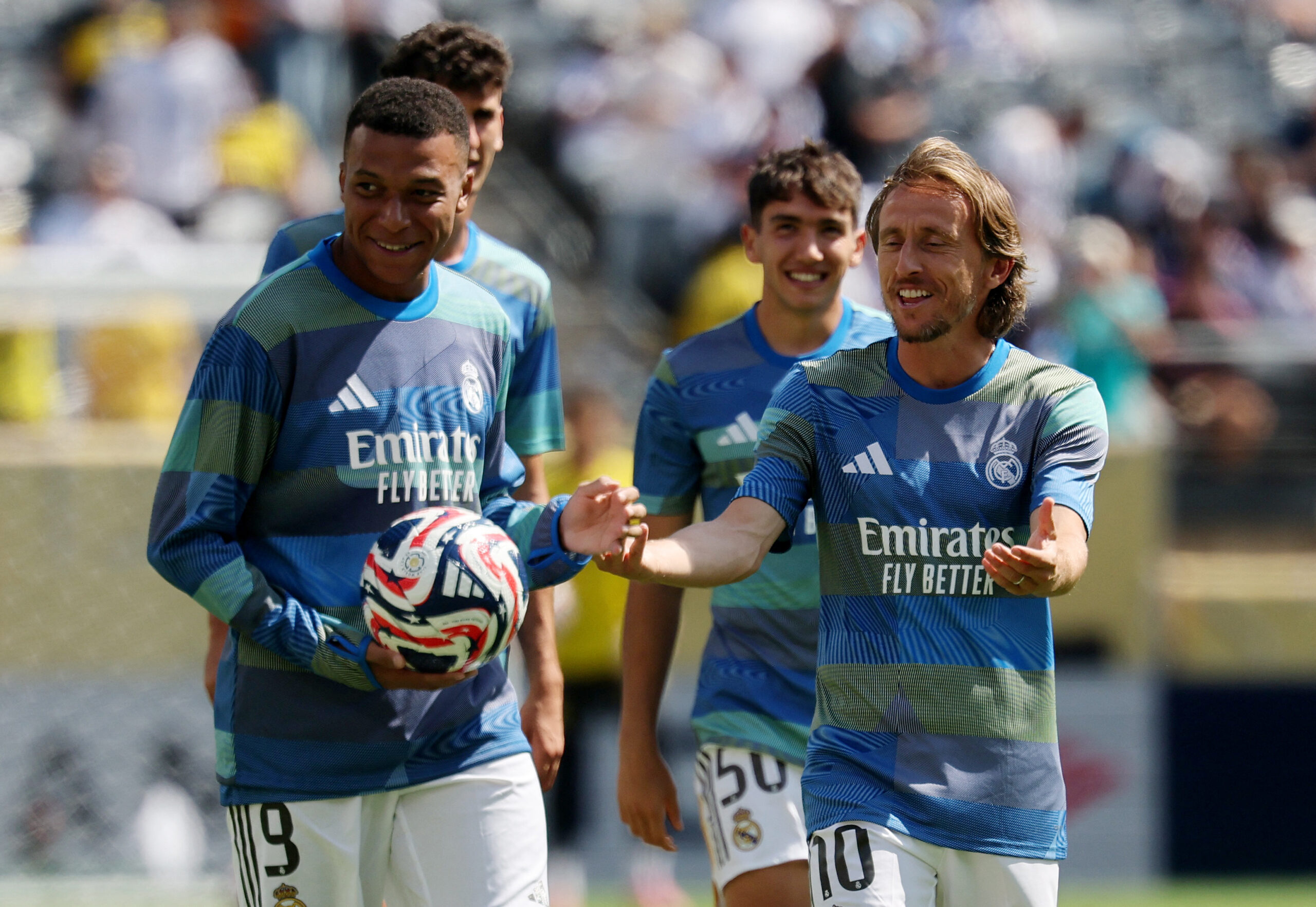 Kylian Mbappe i Luka Modrić/Foto REUTERS