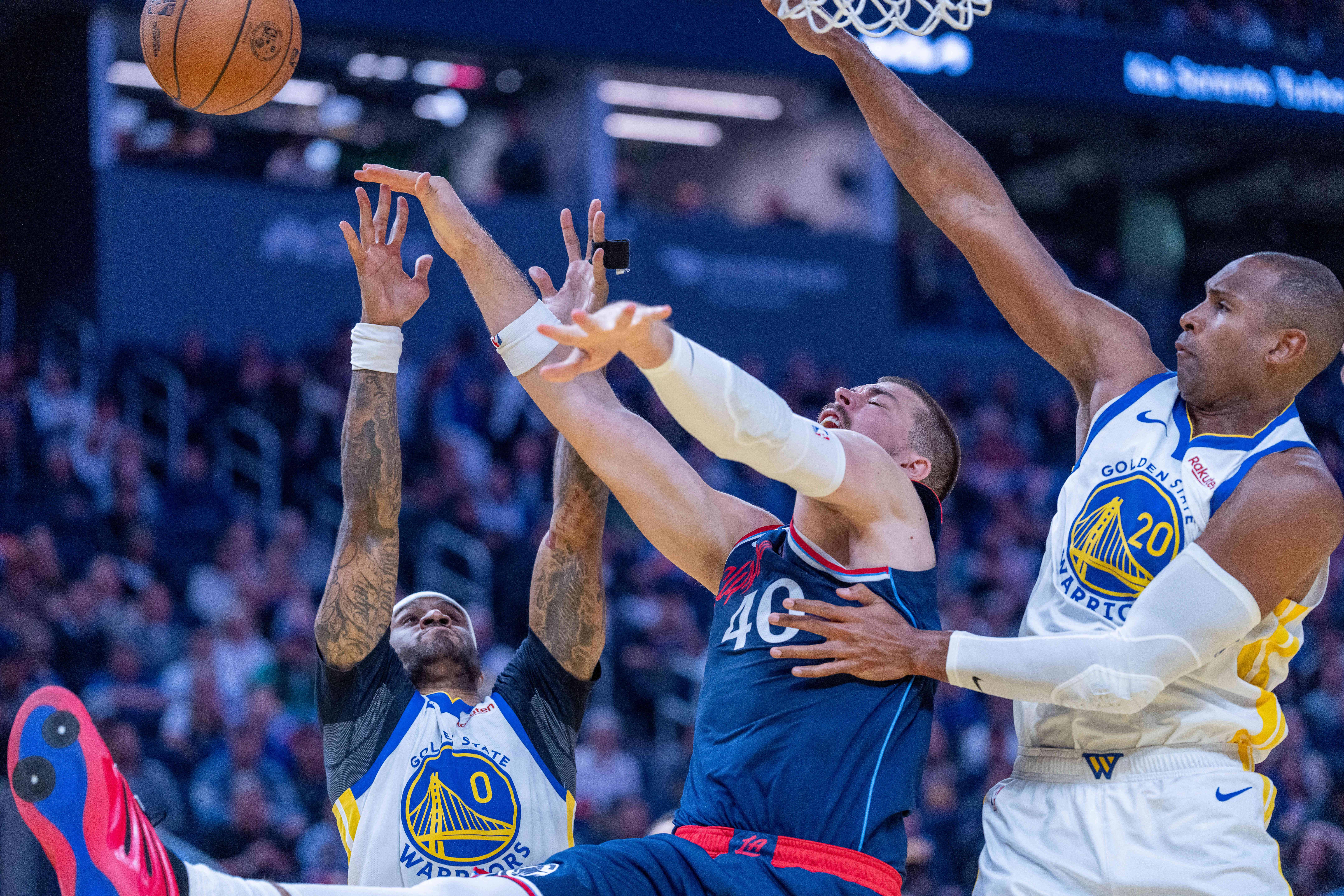 Ivica Zubac i Gary Payton II/Foto REUTERS
