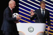Gianni Infantino i Aleksander Čeferin / Photo by Pau BARRENA / AFP